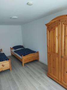 Postel nebo postele na pokoji v ubytování Fewo Donna