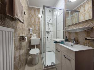 Koupelna v ubytování Hotel Garni Hutter