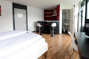 Rúm í herbergi á Berger Zentrum