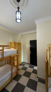 Postel nebo postele na pokoji v ubytování Appartement 4 en bord de la mer à Azla