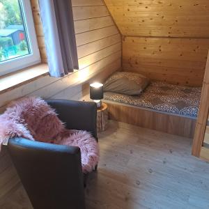 Część wypoczynkowa w obiekcie Jaśkowe Wzgórze domki na wynajem Szymbark, balia, Domek nr 2 i 3