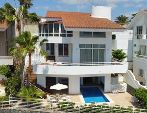 an aerial view of a house with a swimming pool at Luxury Villa Taoro private heated pool Free Car Except Christmas in Adeje