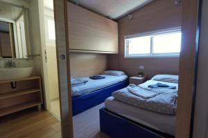 Postel nebo postele na pokoji v ubytování House Lena