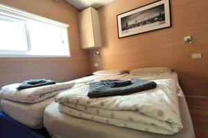 Postel nebo postele na pokoji v ubytování House Lena + 37 fotografií
