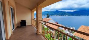 a balcony with a view of the water at View Apartment in Krašići
