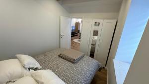 Ένα ή περισσότερα κρεβάτια σε δωμάτιο στο Apartman TOMA