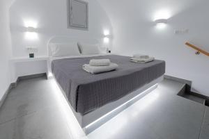 Voodi või voodid majutusasutuse Golden View Suites toas