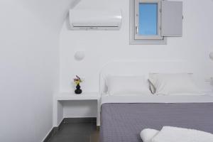 Voodi või voodid majutusasutuse Golden View Suites toas