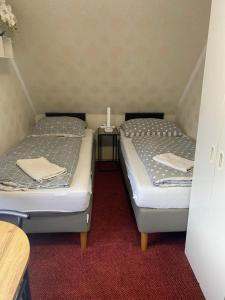 Letto o letti in una camera di Homestay U Hanky