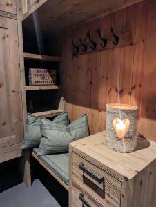 a room with a table with a heart candle on it at Liaplassen Tømmerhytte in Beitostøl +38 photos