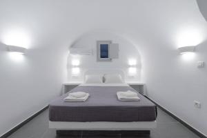 Postel nebo postele na pokoji v ubytování Golden View Suites