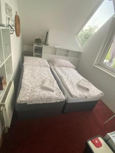 Letto o letti in una camera di Homestay U Hanky
