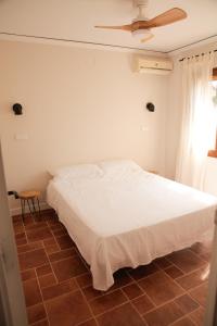 Posteľ alebo postele v izbe v ubytovaní DENIAHOUSE + 37 fotografií