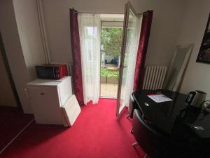 TV o dispositivi per l'intrattenimento presso Homestay U Hanky