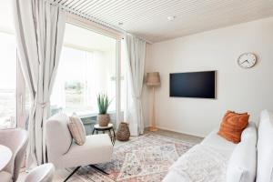 Televisyen dan/atau pusat hiburan di Mainingin Loiste C2 - Luxury holiday