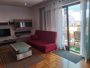 TV a/nebo společenská místnost v ubytování Apartment Krišković