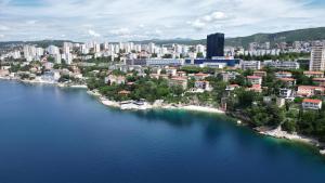 an aerial view of a city with a body of water at SLAVANTE RESIDENCE in Rijeka