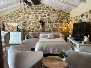 Posezení v ubytování La Esencia Casa Rural