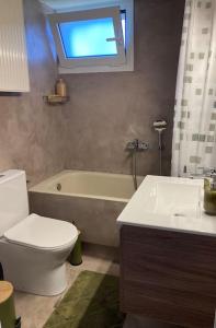 Koupelna v ubytování Sea-Si Holiday Apartment + 48 fotografií