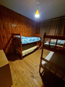 Ένα ή περισσότερα κρεβάτια σε δωμάτιο στο Pousada Recanto da Paz