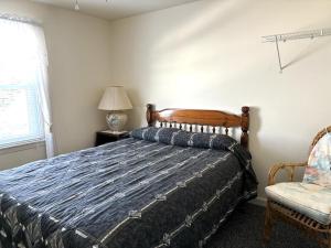 A bed or beds in a room at First Floor Ocean Front Duplex In Ship Bottom