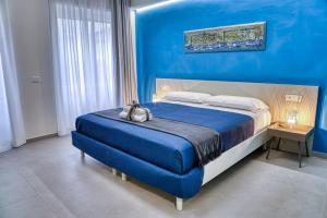 Postel nebo postele na pokoji v ubytování Dedè