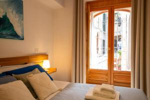 Postel nebo postele na pokoji v ubytování L'ARCO ANTICO - Una Casa sul Mare
