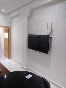 TV a/nebo společenská místnost v ubytování Hassan