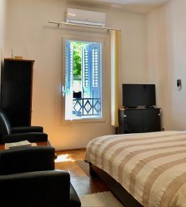 Postel nebo postele na pokoji v ubytování City apartment Amfora + 21 fotografií