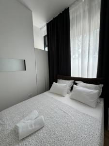 Ένα ή περισσότερα κρεβάτια σε δωμάτιο στο Two bedroom apartment N Split