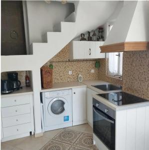 Una cocina o zona de cocina en Per seas