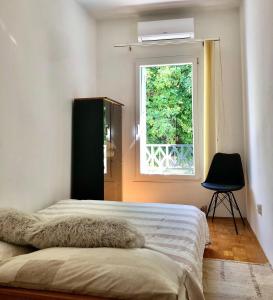 Postel nebo postele na pokoji v ubytování City apartment Amfora
