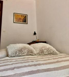 Postel nebo postele na pokoji v ubytování City apartment Amfora