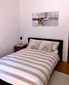 Postel nebo postele na pokoji v ubytování City apartment Amfora