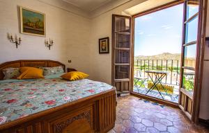 Postel nebo postele na pokoji v ubytování Casa don Eliseo