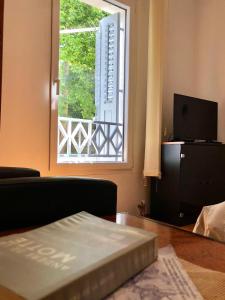 TV a/nebo společenská místnost v ubytování City apartment Amfora