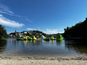 a group of boats parked in the water at Familievennlig Apartment in Tvedestrand