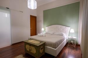 Кровать или кровати в номере Room & Breakfast D'Annunzio