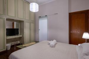 Кровать или кровати в номере Room & Breakfast D'Annunzio