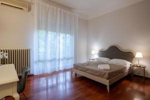 Кровать или кровати в номере Room & Breakfast D'Annunzio