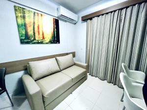 Χώρος καθιστικού στο Flat 625 - Diferenciado com Ar no quarto e na sala
