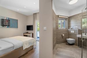 Kúpeľňa v ubytovaní Villa Iponi