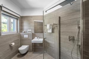 Kúpeľňa v ubytovaní Villa Iponi