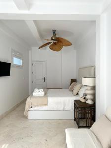 Łóżko lub łóżka w pokoju w obiekcie Apartamento dúplex con piscina privada en terraza