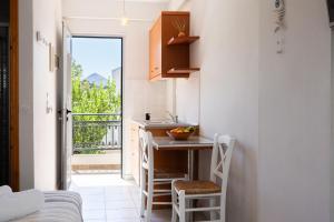 A kitchen or kitchenette at Medousa Studio & Apartments