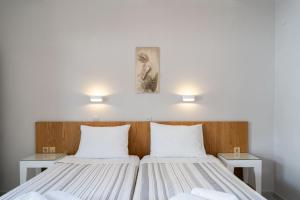 A bed or beds in a room at Medousa Studio & Apartments