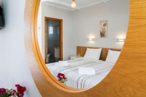 A bed or beds in a room at Medousa Studio & Apartments