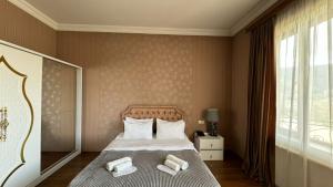 Postel nebo postele na pokoji v ubytování Hotel RichI G A