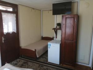 TV a/nebo společenská místnost v ubytování Guest Rooms Dona