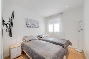 Ένα ή περισσότερα κρεβάτια σε δωμάτιο στο Apartment Magdalena